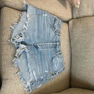 AGOLDE light wash denim jeans in size 30. Slightly distressed